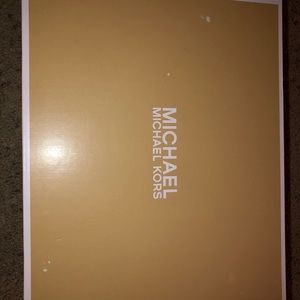 I am selling  Ballard trainer Michael Kors shoes.